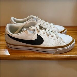 Nike White and Black Sneakers with Gold Accents